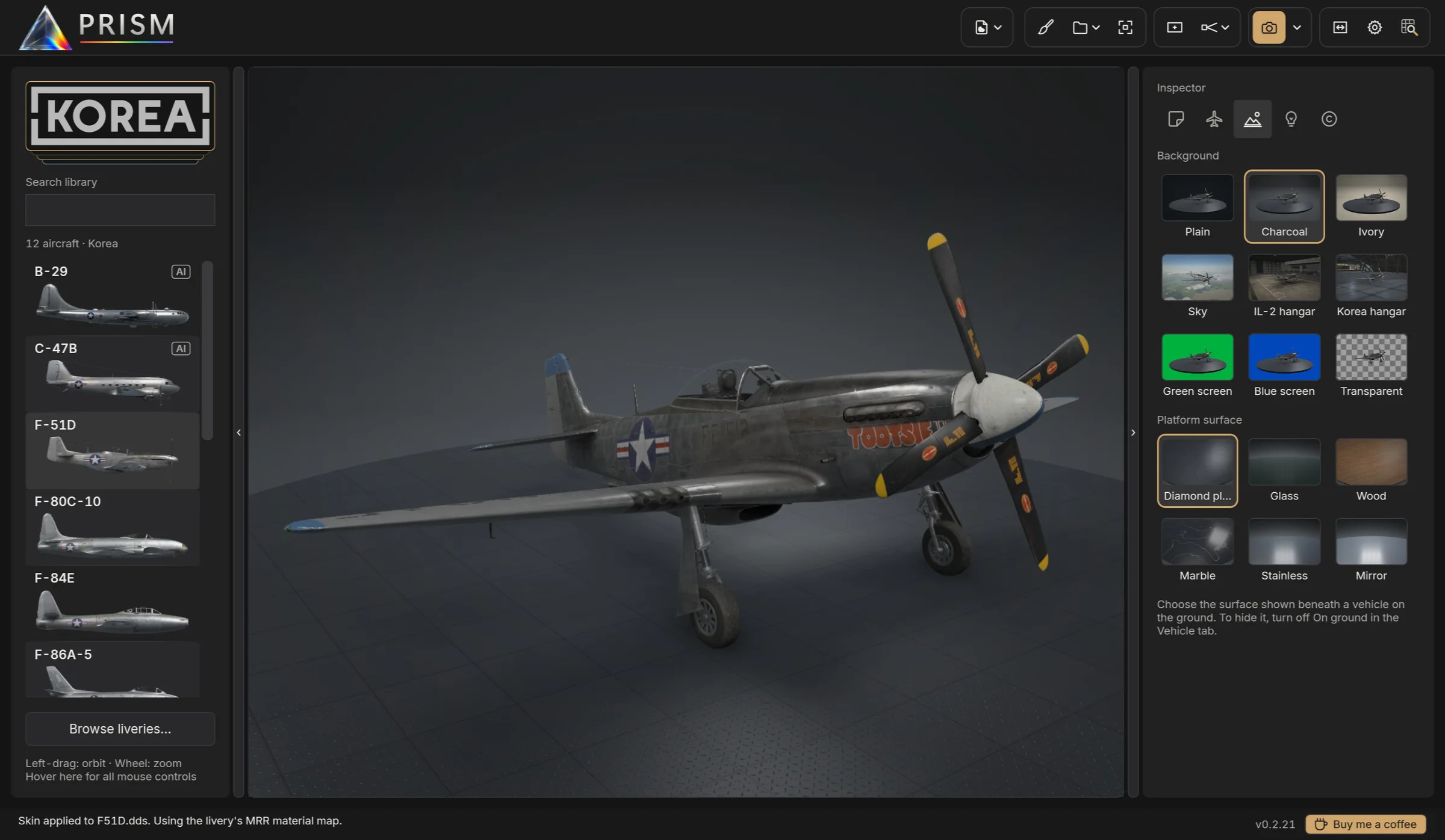 PRISM's main window: the Korea library on the left, an F-51D Mustang in the studio, and the Scene inspector's backgrounds and platforms on the right